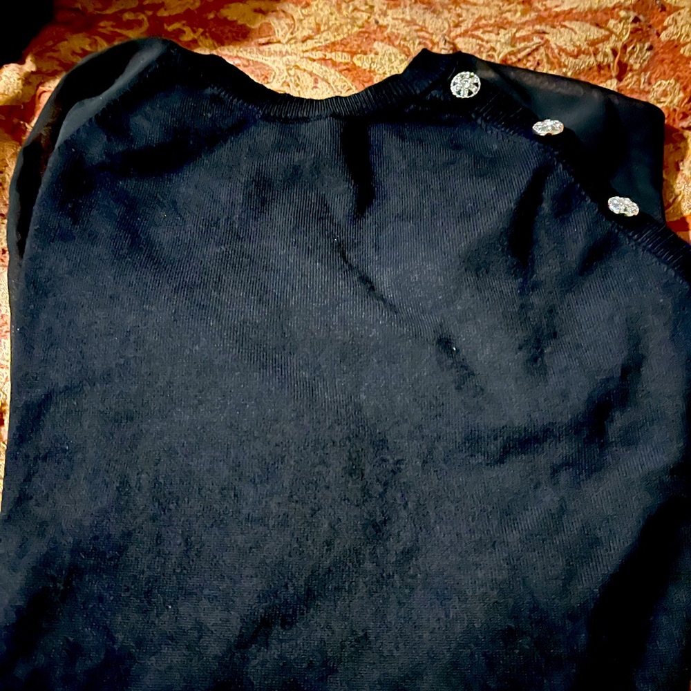 Black sweater with sheer sleeves